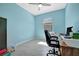 Well-lit office with tile floors, functional layout, and a view to the outside at 5317 Coral Reef Way, Bradenton, FL 34211