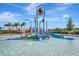 Colorful splash pad with playful water features, offering a fun and safe environment for  at 5317 Coral Reef Way, Bradenton, FL 34211
