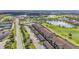 Panoramic aerial view of property featuring golf course, tennis court, and residences at 5517 Palmer Cir # 203, Bradenton, FL 34211