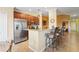 Kitchen with stainless steel appliances and a breakfast bar at 5517 Palmer Cir # 203, Bradenton, FL 34211