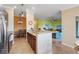 Spacious kitchen with large island, stainless steel appliances, and an open floor plan at 5517 Palmer Cir # 203, Bradenton, FL 34211