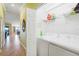 Laundry area with newer washer/dryer unit and shelving at 5517 Palmer Cir # 203, Bradenton, FL 34211