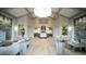 A grand lobby featuring modern decor, including stylish furniture and decorative wood-look accent walls at 5517 Palmer Cir # 203, Bradenton, FL 34211