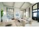 A modern lobby with elegant seating, stylish decor, and ample natural light, creating an inviting atmosphere at 5517 Palmer Cir # 203, Bradenton, FL 34211