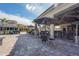 Inviting outdoor patio area with elegant seating and dining options, perfect for social gatherings at 5517 Palmer Cir # 203, Bradenton, FL 34211