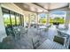 Covered outdoor patio with ample seating, ideal for dining and socializing with picturesque views at 5517 Palmer Cir # 203, Bradenton, FL 34211