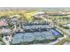 Beautiful view of the community's multiple tennis courts with lush landscaping and nearby clubhouse at 5517 Palmer Cir # 203, Bradenton, FL 34211