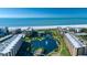 Beautiful condo complex on the beach with a lake, fountains, and a community pool with ocean views at 5740 Midnight Pass Rd # 402, Sarasota, FL 34242