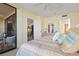 Bedroom with private balcony access and a calming view of the ocean at 5740 Midnight Pass Rd # 402, Sarasota, FL 34242