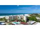 Beachside condo with stunning views of the Gulf, a pristine beach, and a refreshing community pool at 5740 Midnight Pass Rd # 402, Sarasota, FL 34242