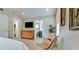 Serene main bedroom features a comfortable seating area and ensuite bath with shower at 5802 De Palmas Ave, Holmes Beach, FL 34217