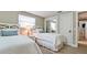 Charming bedroom with twin beds, a mirrored closet, and beach-themed decor for a relaxing getaway at 5802 De Palmas Ave, Holmes Beach, FL 34217
