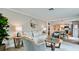 Comfortable living room with neutral decor, an open layout, and hardwood floors at 5802 De Palmas Ave, Holmes Beach, FL 34217