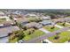 Neighborhood aerial view showcasing well-maintained homes with manicured lawns in a residential community at 5859 Lincoln Rd, Venice, FL 34293