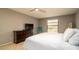 Bedroom featuring tile flooring, neutral walls, closet space, and a ceiling fan at 5859 Lincoln Rd, Venice, FL 34293