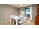 Inviting dining room with direct access to the screened in lanai area at 5859 Lincoln Rd, Venice, FL 34293
