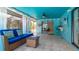 Lanai featuring a seating area, outdoor bar, tile floors, and view into living room at 5859 Lincoln Rd, Venice, FL 34293