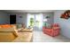 Inviting living room featuring neutral walls, tile floors, and lots of natural light at 5859 Lincoln Rd, Venice, FL 34293