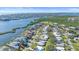 Waterfront community with mature trees and lush landscaping at 5869 Tidewood Ave # 7, Sarasota, FL 34231