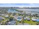 Waterfront property boasting a pool and lush landscaping at 5869 Tidewood Ave # 7, Sarasota, FL 34231