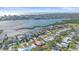 Single-story home surrounded by mature trees at 5869 Tidewood Ave # 7, Sarasota, FL 34231