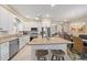 Spacious kitchen with stainless steel appliances, ample counter space, and a large island, great for cooking and entertaining at 5869 Tidewood Ave # 7, Sarasota, FL 34231