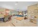 Spacious living area showcasing an open layout, stylish furnishings, and access to outdoor spaces at 5869 Tidewood Ave # 7, Sarasota, FL 34231