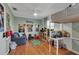 bedroom featuring a loft bed, a comfortable seating area, and plenty of decor at 605 15Th Avenue E Dr, Palmetto, FL 34221