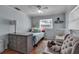 Light and airy bedroom with natural lighting and soft color palette at 605 15Th Avenue E Dr, Palmetto, FL 34221