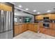 Spacious kitchen featuring granite countertops, stainless steel appliances, and ample cabinet space at 605 15Th Avenue E Dr, Palmetto, FL 34221