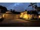 Charming single-story home with a well-maintained lawn, mature trees, and a spacious three-car garage at 6215 Aventura Dr, Sarasota, FL 34241