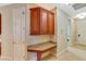 Convenient desk nook with granite countertop and overhead storage cabinets at 7016 Brier Creek Ct, Lakewood Ranch, FL 34202