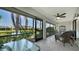 Screened lanai offers beautiful water views and a relaxing space for outdoor enjoyment at 7347 Royal Birkdale Dr, Sarasota, FL 34238