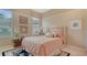 Charming bedroom with neutral tones, plush carpeting, and comfortable furnishings at 7432 Ascot Ct, University Park, FL 34201