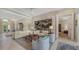 Bright living room featuring high ceilings, neutral tones, elegant furnishings and decor at 7432 Ascot Ct, University Park, FL 34201