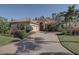 Beautiful one-story home with brick driveway, mature landscaping, and a two-car garage at 7762 Us Open Loop, Lakewood Ranch, FL 34202