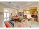 Spacious living room with neutral tones, open layout, and view to other rooms at 7762 Us Open Loop, Lakewood Ranch, FL 34202