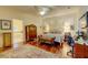 Lovely main bedroom featuring hardwood floors, a sitting area, and natural light at 7762 Us Open Loop, Lakewood Ranch, FL 34202