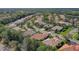 A picturesque neighborhood showcasing well-kept homes, serene ponds, and verdant landscaping at 7762 Us Open Loop, Lakewood Ranch, FL 34202
