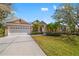 Lovely one-story home with manicured lawn, driveway, and neat landscaping in a sunny setting at 8122 Spring Marsh Dr, University Park, FL 34201