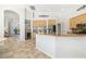 Well-lit kitchen featuring granite countertops, modern appliances, and plenty of cabinet space for storage at 8122 Spring Marsh Dr, University Park, FL 34201