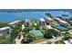 Gorgeous waterfront condos boast mature landscaping, tennis courts, and beautiful views of the bay at 8735 Midnight Pass Rd # 105B, Sarasota, FL 34242