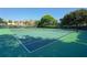 Well-maintained tennis courts offer a fun and active recreational amenity for residents to enjoy at 8735 Midnight Pass Rd # 105B, Sarasota, FL 34242