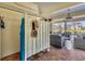 Relaxing outdoor space with shower, brick pavers, and comfortable seating area at 92 Tidy Island Blvd, Bradenton, FL 34210