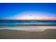 A scenic view of the ocean at sunset at 1035 Seaside Dr # 308, Sarasota, FL 34242