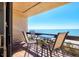 Enjoy stunning ocean views from this condo balcony with outdoor seating area at 1055 Gulf Of Mexico Dr # 405, Longboat Key, FL 34228