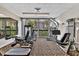 Fitness center offering various machines with a view of the lush outdoor landscaping at 1055 Gulf Of Mexico Dr # 405, Longboat Key, FL 34228