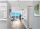 Bright, modern living room showcasing stunning ocean views and contemporary furnishings at 1055 Gulf Of Mexico Dr # 405, Longboat Key, FL 34228