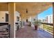 Open-air walkway showcasing brick flooring and views of the surrounding buildings and greenery at 1055 Gulf Of Mexico Dr # 405, Longboat Key, FL 34228