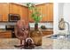 Kitchen detail with granite countertops, stainless steel appliances, and decorative accents at 11412 Autumn Leaf Way, Bradenton, FL 34212